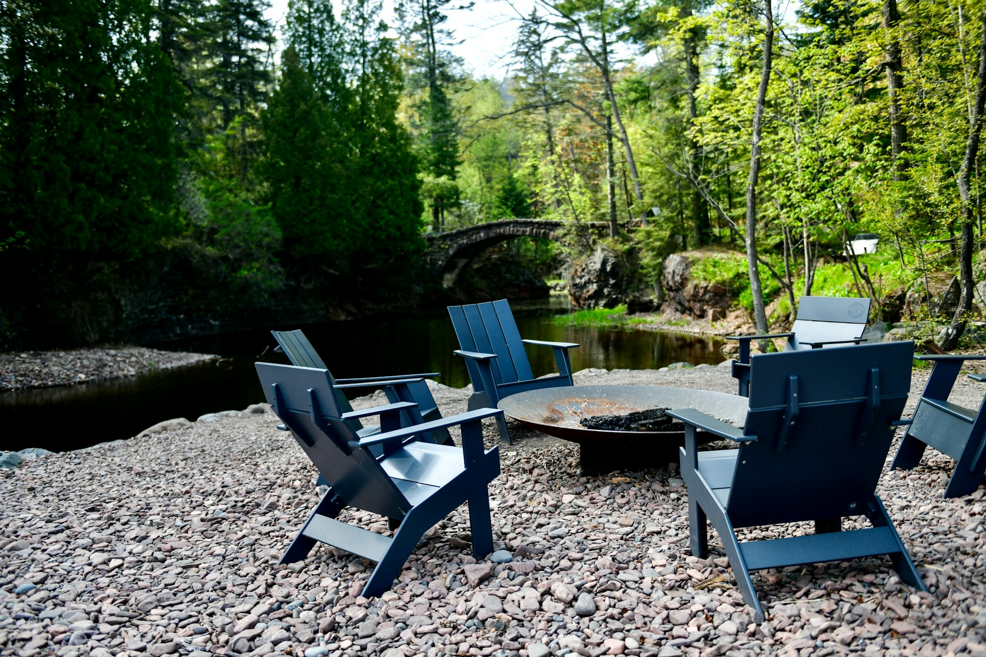 Two chairs facing the water, set for conversation